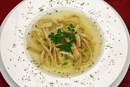 Frittatensuppe - Clear soup with sliced pancakesの写真素材
