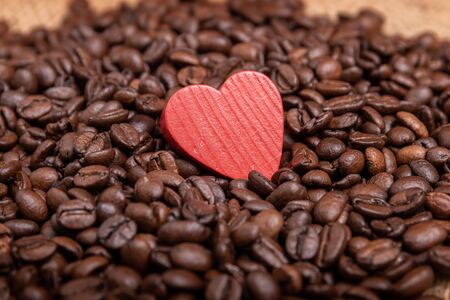 Cup of coffee, bag and scoop on old backgroundの写真素材