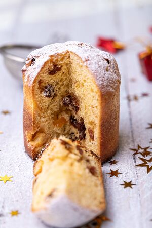 Traditional Christmas panettone with dried fruits and orange zestの写真素材