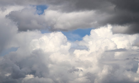 Skyscape. Cumulus clouds in close-up. Abstract photography.