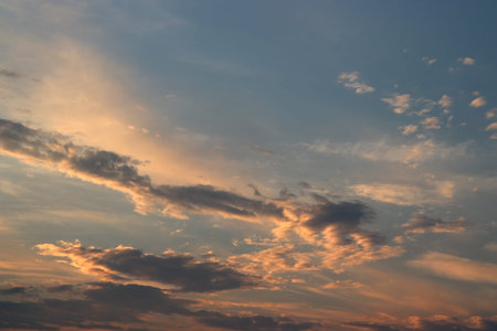 Sky landscape. Colorful sunset. Horizon line in dark key.