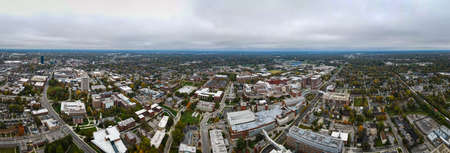 Aerial panorama of downtown Lexington, Kentucky with tall office buildings visible in a distance in the right side of the imageのeditorial素材