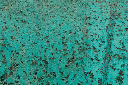 Old blue painted metal surface with rust and peeling paint. Abstract background for design.の写真素材