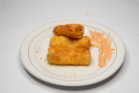 Risol is a typical Indonesian food whose contents are vermicelli with a layer of sago rolled using...