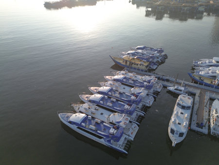 April, 24 2023, several fast passenger boats lined up off the coast of Muara Angkeの写真素材