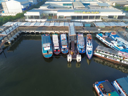 April, 24 2023, several fast passenger boats lined up off the coast of Muara Angkeの写真素材