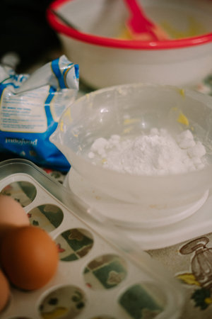 sugar flour weighed on a cake scale. Mixed ingredients for Eid cake.