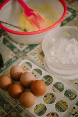 sugar flour weighed on a cake scale. Mixed ingredients for Eid cake.