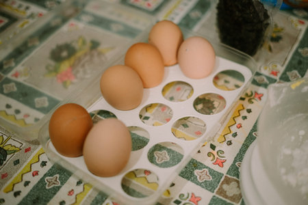 Chicken eggs ready to be used as a mixture for Eid cake dough.