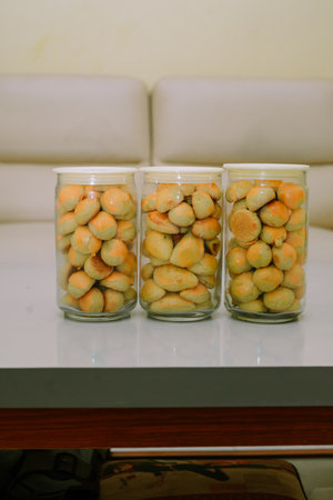 three jars of "nastar" cakes are served on the table. Nastar cake is a typical Eid cake.の写真素材