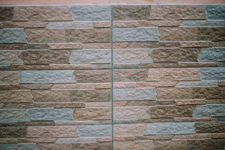 Ceramic tiles arranged symmetrically on a wall