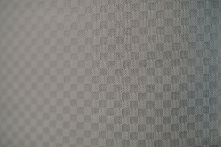 Symmetrical pattern of checkered fabric, creating a striking visualの写真素材