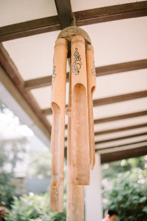 Beautiful bamboo decoration hangs on the roof terraceの写真素材