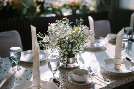 Elegant dining table with luxurious decor, perfect for a refined dining experience.の写真素材