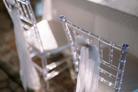 Bogor, June 21 2024. Elegant wedding table decor, featuring white flowers and candles, perfect for a solemn ceremonyの写真素材