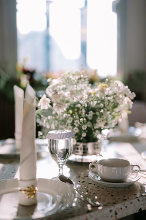Elegant dining table with luxurious decor, perfect for a refined dining experience.の写真素材