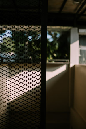 A thick wire fence with an industrial look, adding a strong, modern aesthetic, perfect for architecture, urban design, and industrial projectsの写真素材
