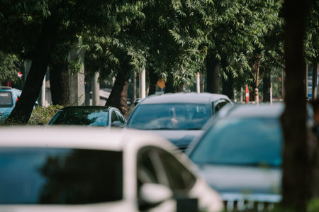 traffic congestion on a major Jakarta road, capturing the busy urban atmosphere with a line of vehicles, perfect for cityscape, transportation, and urban lifestyle projects.の写真素材