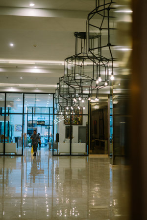 A hotel foyer often used for food displays before the main hall, featuring luxurious lighting and ornate ironwork decorationsのeditorial素材