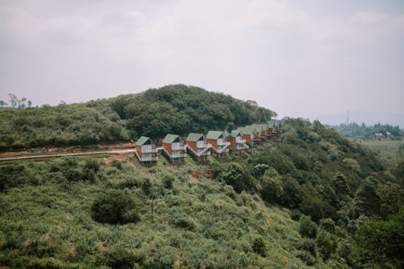 A stunning villa perched on a hilltop, offering breathtaking panoramic views of the surrounding landscape.の写真素材