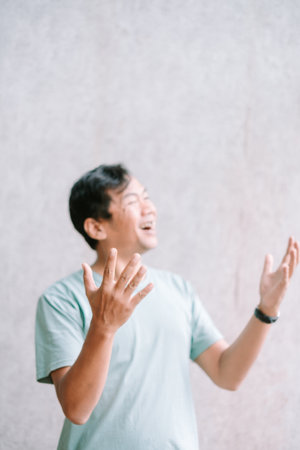 Man expressing exuberant laughter and joy.の写真素材