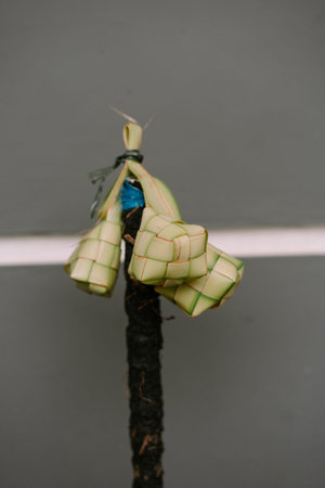 Ketupat, a rice dumpling encased in woven palm leaves, displayed for Eid al-Fitr celebrations....