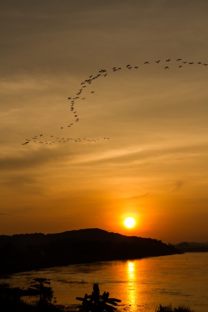 sunset at Mekong river bwtween Thailand and Loasの写真素材