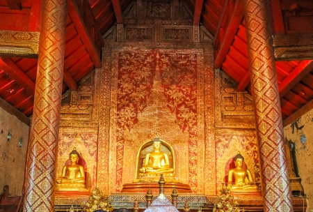 golden buddha image  in chiang mai temple of Thailandの写真素材