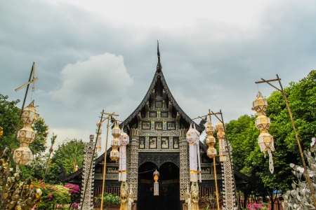 antique wooden temple with yipeng festival decoration in Chiang mai of Thailandの写真素材
