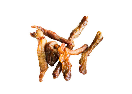 dry pork deep fried on white backgroundの写真素材