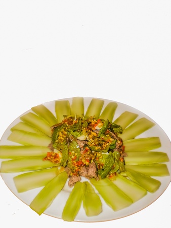 Thai spicy pork salad on white backgroundの写真素材