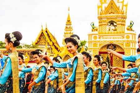 NAKHON PHANOM ,THAILAND-OCTOBER 30  A group of Thai dancers perform Thai dancing in front of Pratat Pranom pagoda on 30 October 2012 at Nakhon Pranom ,Thailand のeditorial素材