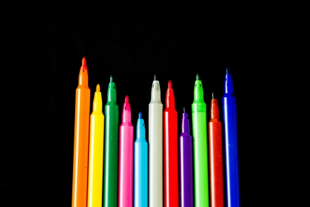 colorful fibre marker pens on black backgroundの写真素材
