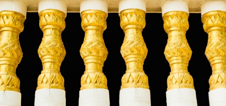 Thai style golden pillars in the buddist temple の写真素材
