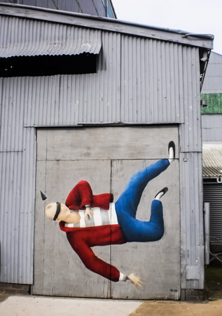 SYDNEY-NOVEMBER 13 :Painting on the  wall at Cockatoo island art exibition on 13 November 2012  .Cockatoo island is a small island in Sydney river.のeditorial素材