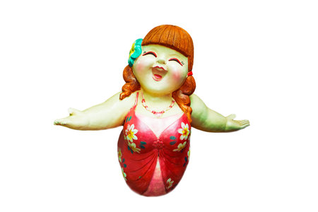 Plaster doll of a happiness girl on the white background の写真素材