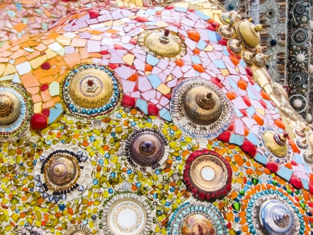 Colorful unique design wall which made from broken tiles.の写真素材