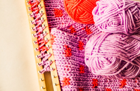 Purple and red wools knitting close up pattern and materials.の写真素材