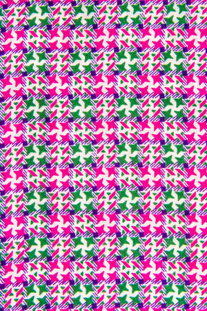 Colorful fabric pattern close up background.