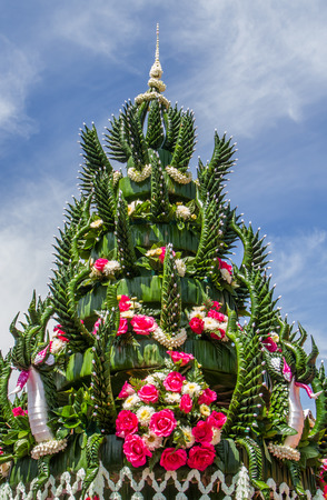 Banana leaf in Thai style flower decoration for buddhist sacrificial ceremony.の写真素材