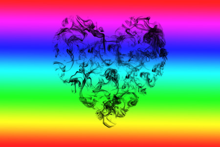 Heart sign of smoke on colorful  background.の写真素材