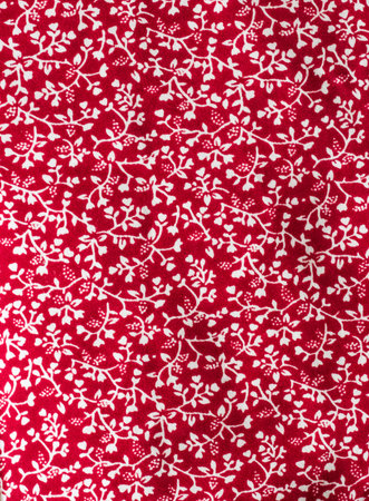 Flower print fabric close up background.
