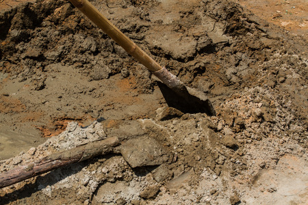 Concrete mixing by shovel for construction.の写真素材