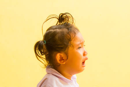 Asian girl crying with tears come out.の写真素材