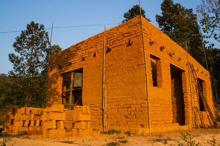 Earthen house in country between construction.のeditorial素材