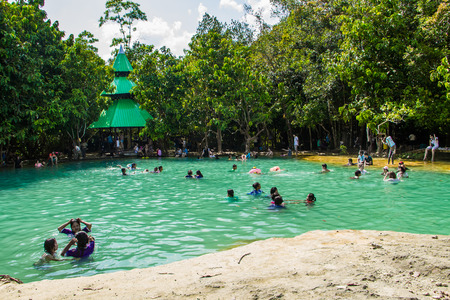 KRABI,THAILAND-MARCH 7 : Tourist enjoy Emerald pool in Krabi,Thailand on March 7,2015.Emerald pool is nature pool in the forest.のeditorial素材