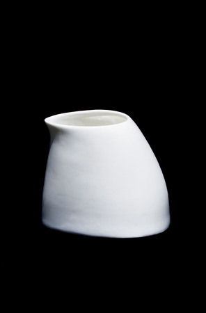 White jug on black background.の写真素材