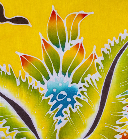 Abstract of batik style fabric close up background.の写真素材