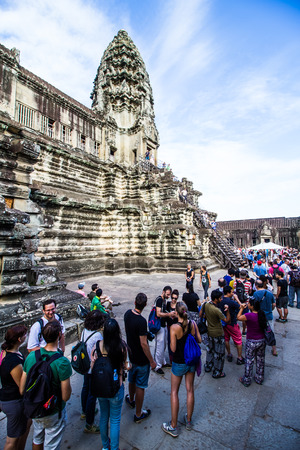 SIEM REAP,CAMBODIA-NOVEMBER 30 : Group of tourist queue up to go on top of Angkor Wat on November 30,2015.Angkor Wat is one of the world tourist attraction.のeditorial素材