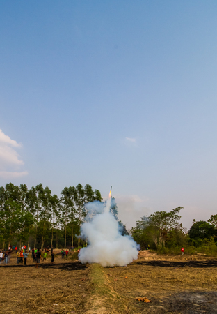 SAVANNAKHET,LAOS-MARCH 29 :Rocket going to the sky in Rocket festival on March 29,2016.This event for celebrate raining season.のeditorial素材